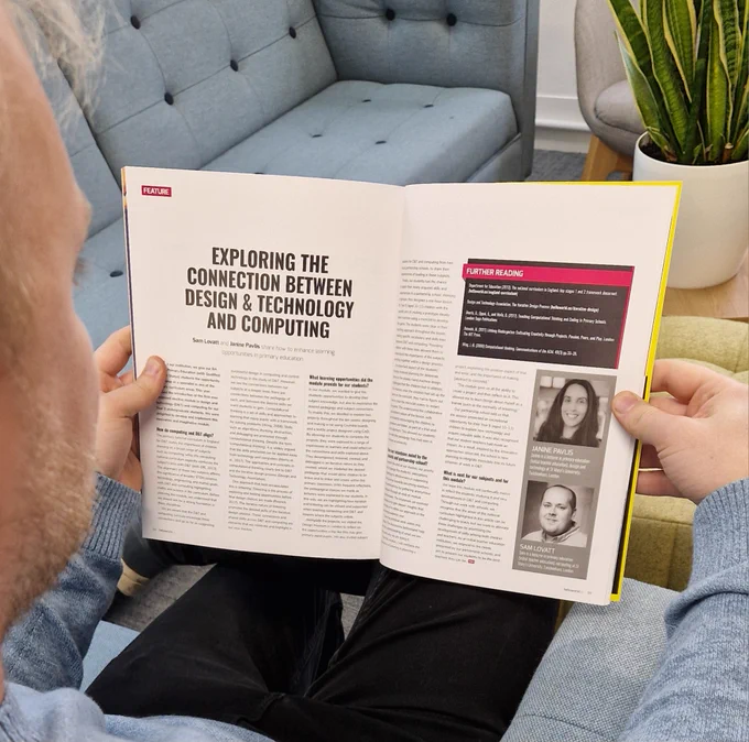Over the shoulder photo of a person reading Sam Lovatt and Janine Pavlis' article 'Exploring the connection between design & technology and computing' in Hello World, issue 25.