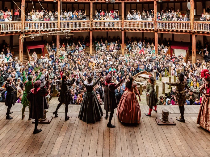 The Company of The Comedy of Errors (2024). 

A group of actors in Elizabethan costumes performs on stage in the Globe Theatre. 

Photography by Leora Bermeister. 