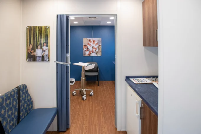The inside of the Community Care Coach, from the entrance looking in. 
