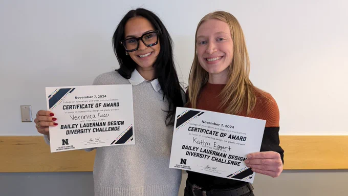 Veronica Cucci and Katlyn Eggert with their winners' certificates.