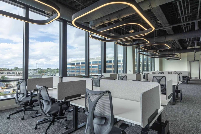 Premium office space with raisable desks.