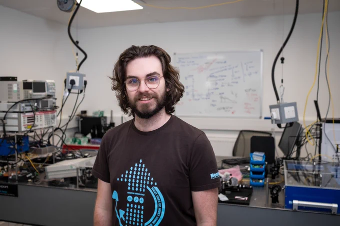 Luke Peters pictured in the photonics lab
