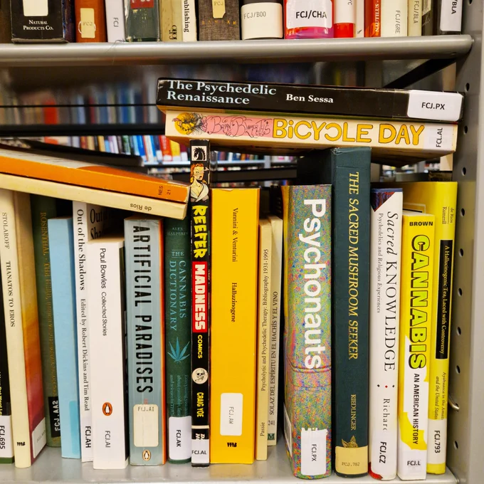 Another shelf on psycho-active substances: “Artificial Paradises” “Reefer Madness Comics”, “Psychonauts” “The Sacred Mushroom Seeker”, “A Hallucinogenic Tea, Laced with Controversy”...