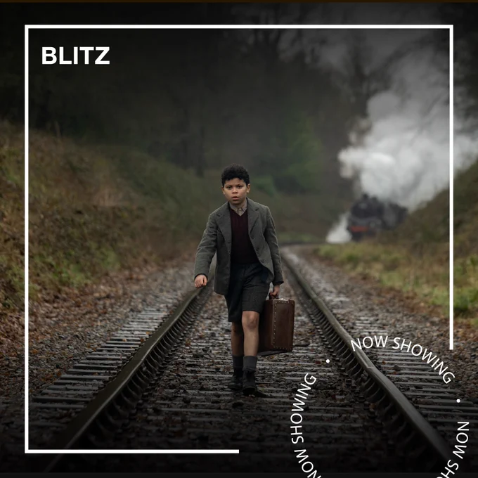 A young boy holding a case, dressed in 1940s clothes, walks down a railroad track with a steam train behind him. Text - Blitz, Now Showing