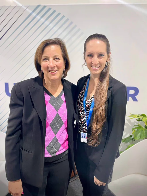 PRM Acting Assistant Secretary Marta Youth stands with Aubrey Paris of the U.S. Secretary of State's Office of Global Women's Issues.