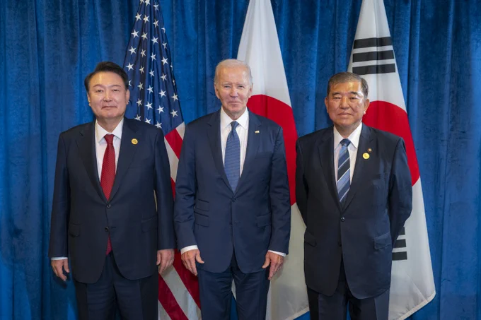 President Biden, President Yoon Suk Yeol, and Prime Minister Ishiba Shigeru take a group photo.