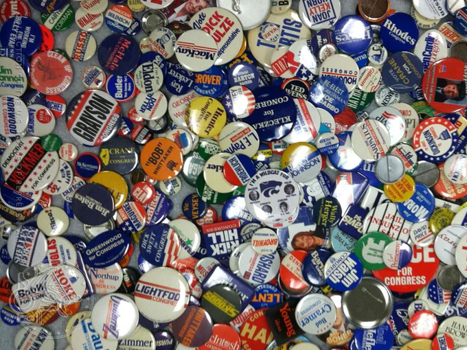 A large pile of campaign buttons.