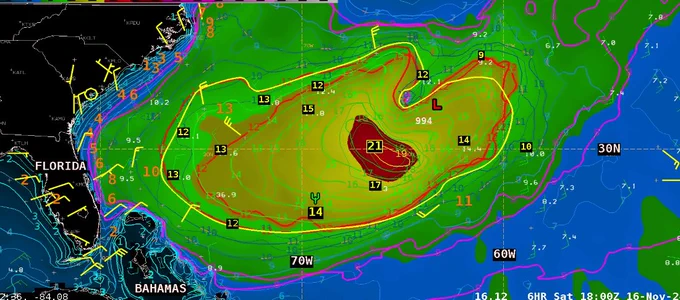 Color image of GFS wave height forecast valid 1800 UTC, with wave height contours of GFS and ECMWF wave models overlaid in fine lines, with red lines indicating 12 ft. Thick yellow contour identifies area of seas 12 ft and greater, with wave height observations in yellow numerals (feet), with estimated maximum seas of 21 ft. Green goalpost symbol shows location of Saildrone 1041 at 17Z measuring seas of 4.2 meters.