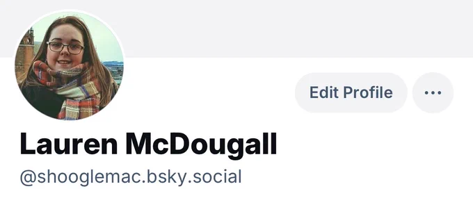 Image is a screenshot of a username and profile picture. The username is @shooglemac.bsky.social