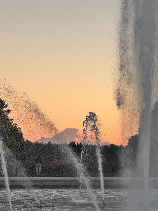 Mt Rainier vast the Drumhellen fountain as seen from campus.
