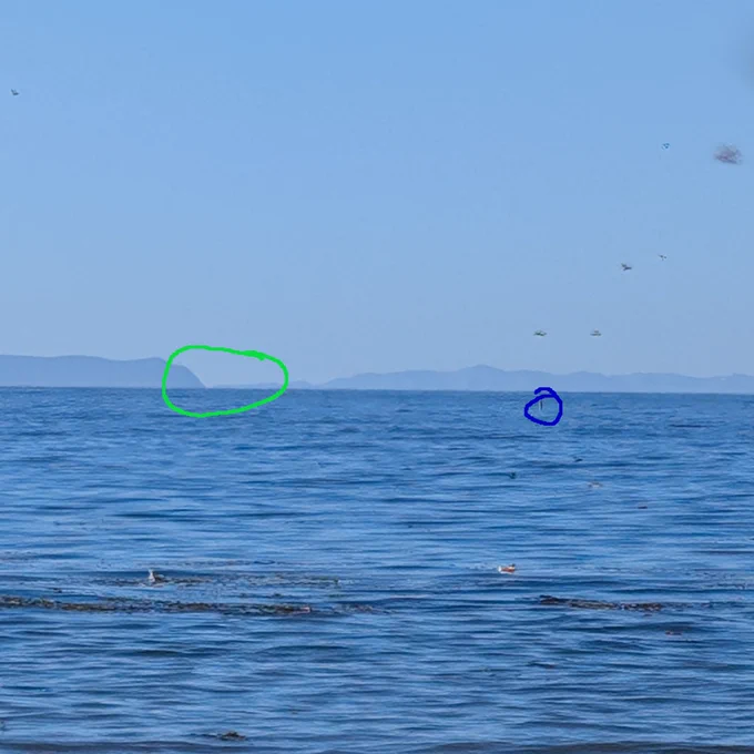 Photo 4, about 10 ft of elevation. the target of my photo is circled in green, the red circle is around a buoy that can also be seen in photo 3