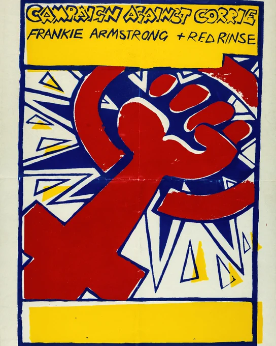In a bold comic book style and colours, the feminist symbol of a fist within the venus symbol is in vivid red with a spiky blue action bubble around. “Campaign against Corrie Frankie Armstrong   Red Rinse”.