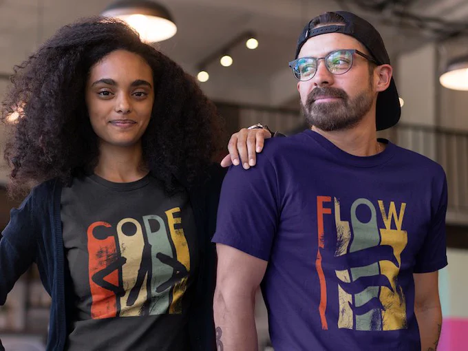 A man and a woman showcase their t-shirts. one displaying the word "flow" in a stylish font, and the other "code" in the same font. Each letter is a different colour, and the colour runs down beneath each letter.