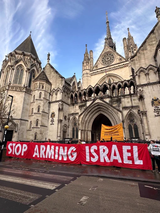 Banner outside High Courts reads Stop Arming Israel