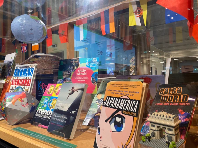 Image of Study Abroad book display with colourful international books and Lego