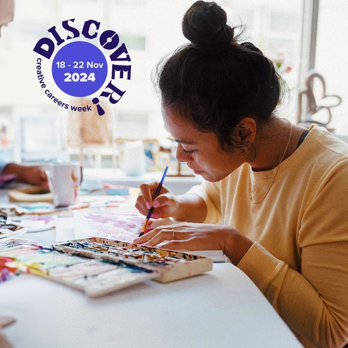 Image of a woman painting