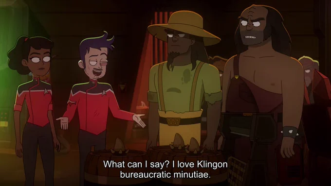 Screenshot from Star Trek: Lower Decks. Mariner and Boimler talking to 2 Klingons. Subtitles: "What can I say? I love Klingon bureaucratic minutiae."