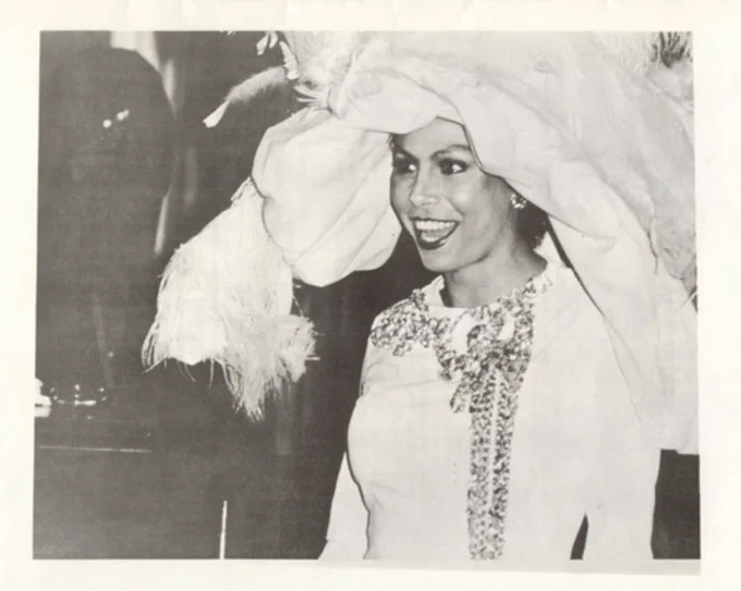 photo of Java wearing a large hat