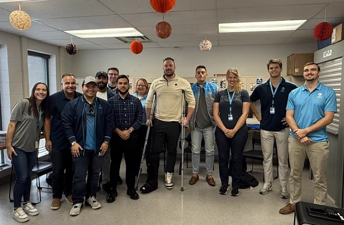Team members posing for a photo