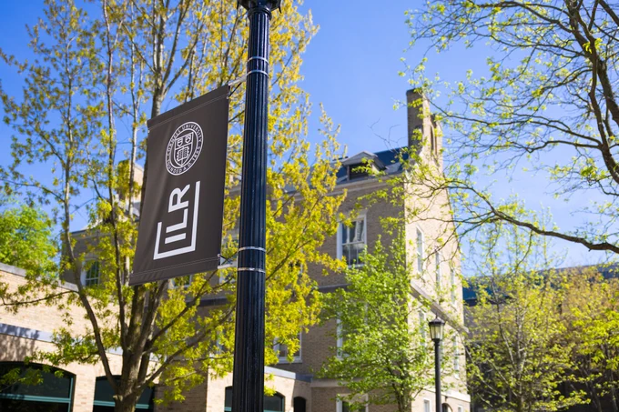 Banner with ILR and Cornell University logos, with ILR Ithaca campus buildings in the background
