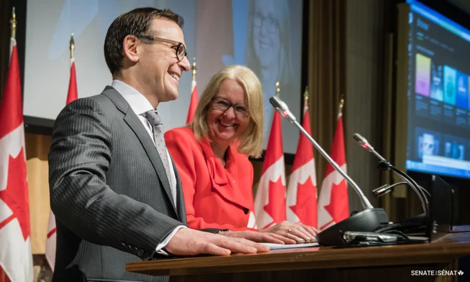 Senators Leo Housakos and Jane Cordy, the chair and deputy chair of the Senate Subcommittee on Communications, address a crowd during a 2017 event to announce the Senate’s partnership with the social media platform formerly known as Twitter. 