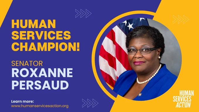 A purple and yellow rectangle. On the left-hand side the text reads: "Human Services Champion! Senator Roxanne Persaud. Learn more: www.humanservicesaction.org." On the right-hand side there is a photo of Senator Persaud, a Black woman with short dark hair. She is wearing a blue shirt and a white necklace.