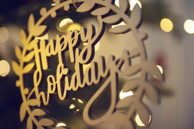 A design states, "Happy Holidays." Photo by Jamie Coupaud on Unsplash