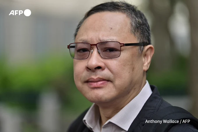 File photo: Law professor Benny Tai reacts before entering the West Kowloon Magistrates Court in Hong Kong on April 10, 2019. A group of Hong Kong activists face jail after being convicted on April 9 on colonial-era "public nuisance" charges for their role in organising mass pro-democracy protests that paralysed the city for months and infuriated Beijing. (Anthony Wallace / AFP)
