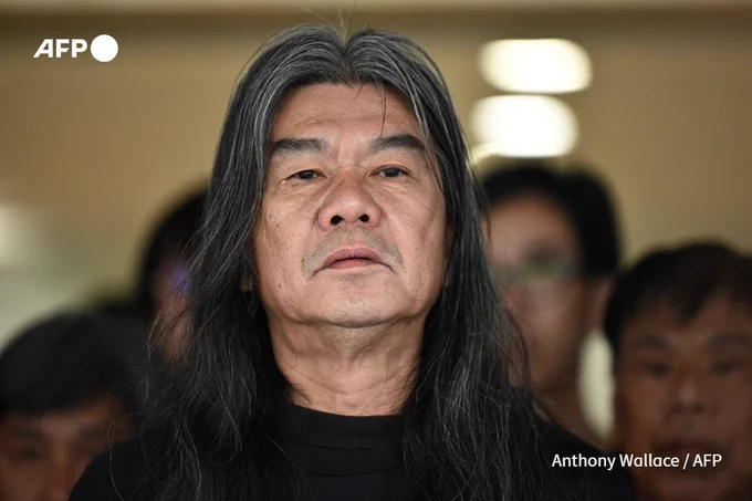 File photo: Ousted pro-democracy lawmaker Leung Kwok-hung, also known as 'Long Hair' reacts before entering the High Court to hear the sentence for his appeal over his disqualification from Legco in Hong Kong on February 15, 2019. (Anthony Wallace / AFP)