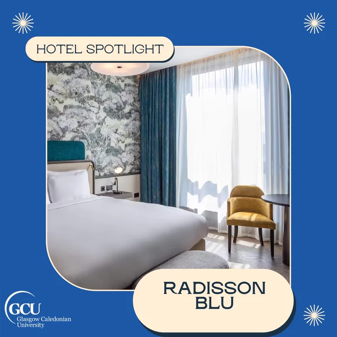Hotel Spotlight: Radisson Blu. Image of a hotel room with double bed and armchair.