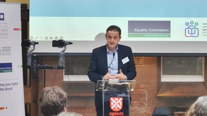 A photo of Professor Colin Harvey, Commission Member of the Irish Human Rights and Equality Commission, speaking at the launch of joint research on EU developments on equality and human rights in Riddel Hall.