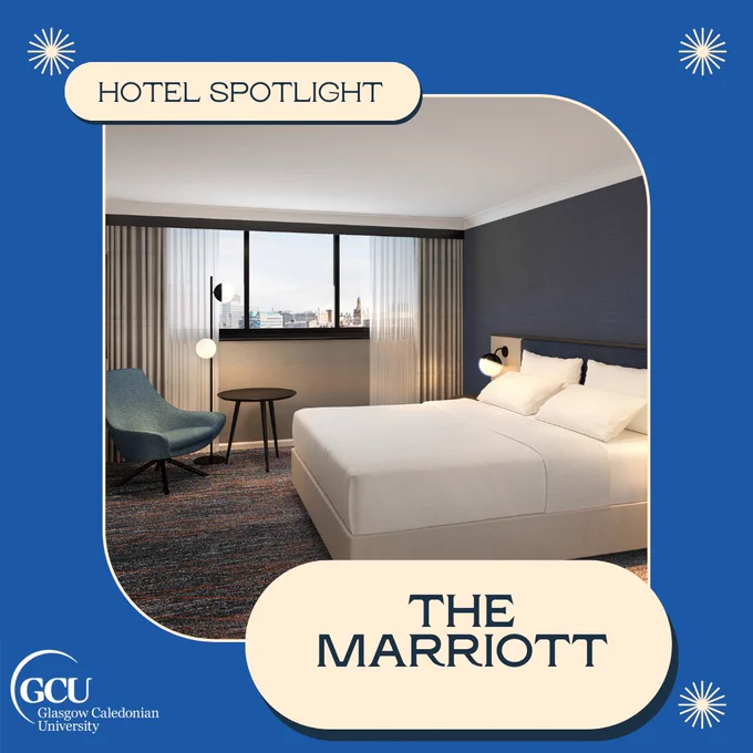 Hotel Spotlight: The Marriott. Image of a hotel room with double bed and armchair.
