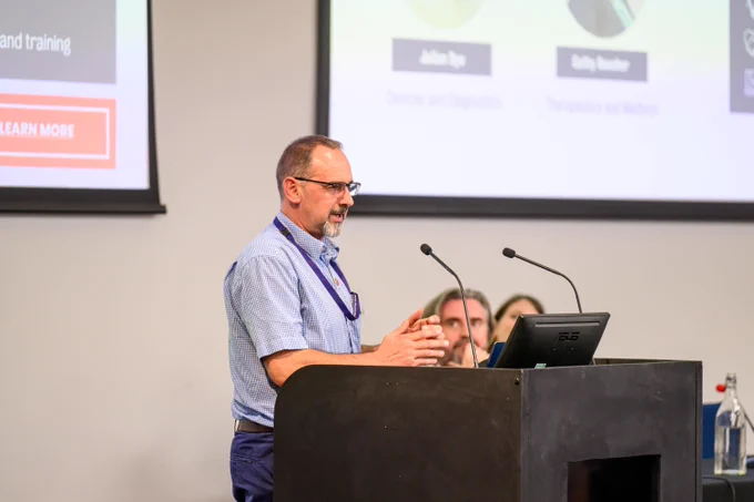 Dr Mike Lyne, Director of Translation, presenting at the 2024 ECR conference.