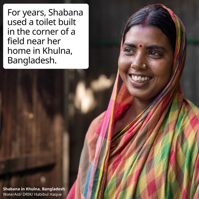 A photo of a woman in a checked saree smiling off centre - her name is Shabana and the text reads: For years, Shabana used a toilet built in the corner of a field near her home in Khulna, Bangladesh.