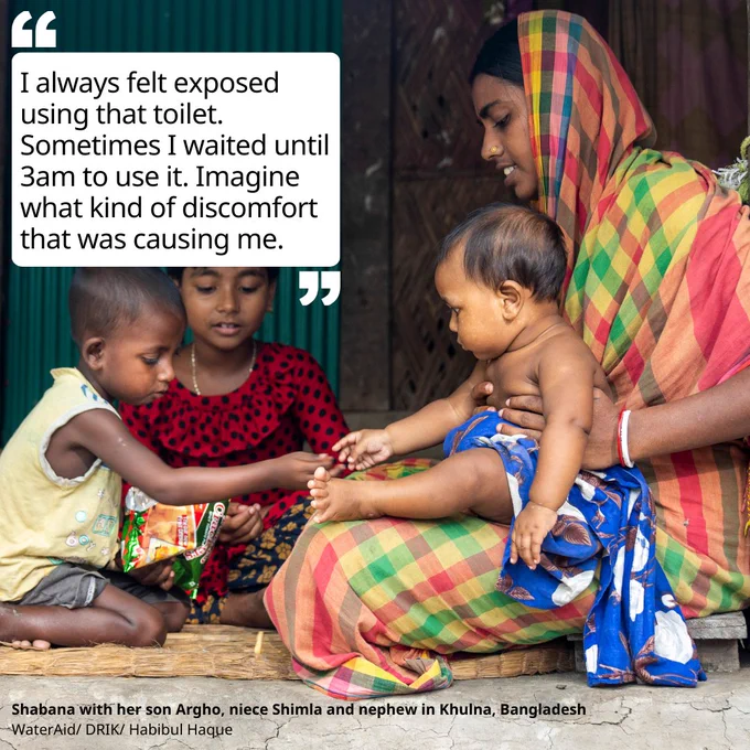 A photo of a woman wearing a checked saree with two small children and a baby on her lap. Text reads: I always felt exposed using that toilet. Sometimes I waited until 3am to use it. Imagine what kind of discomfort that was causing me.