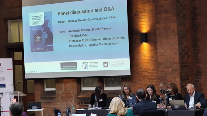 A photo of a panel discussion on the EU developments in equality and human rights research findings with Professor Rory O’Connell, Annmarie O’Kane, Border People, Una Boyd, Committee on the Administration of Justice, and Roisin Mallon, Director of the Dedicated Mechanism Unit, Equality Commission, chaired by Mairead Holder, Commissioner at the Northern Ireland Human Rights Commission.