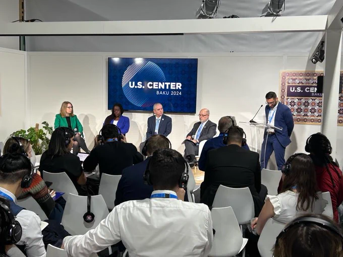 Dr. Spinrad (directly to the left of the podium) discusses what it will take to create a climate-ready workforce at the U.S. Center. As climate impacts shift lives and livelihoods, countries and communities around the globe need rapid and foundational workforce changes to ensure that the right talent is developed and ready to take action on mitigation and adaptation. 
