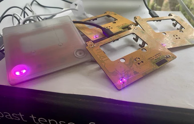 Four Pickup boards with the violet debugging LED on, signaling that it's connected to MQTT.