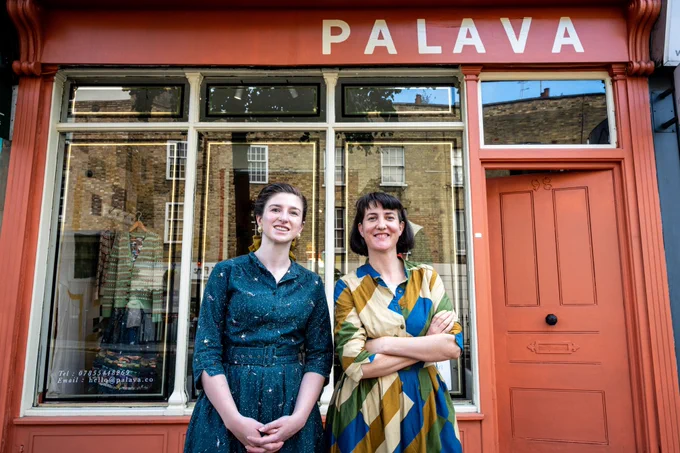 A photo of Bryony and Emma outside their clothing store called Palava, on the Caledonian Road in Islington.