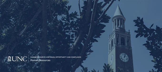 UNC Human Resources and Equal Opportunity and Compliance - UNC Bell Tower framed by trees
