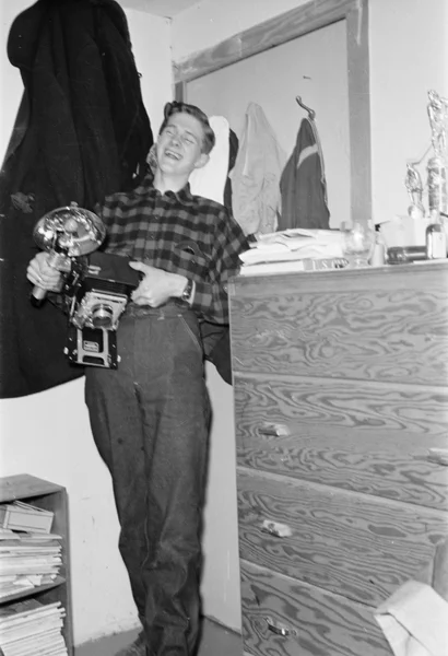 Rolf with his Speed Graphic camera, his basic camera that he used for many years, ca. 1946

Rolf and Margaret Hougen fonds, 2009/81 #636
