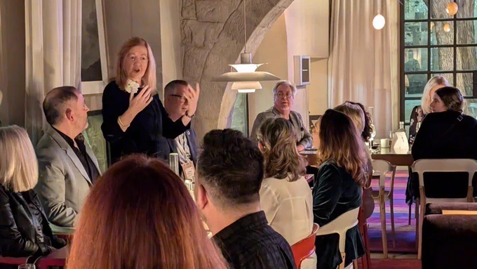 Image of VisitEngland Chairman Victoria Borwick standing giving a speech at our annual client reception to an audience.