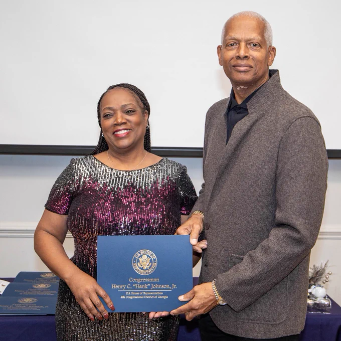 Photo from Congressman Hank Johnson’s Unsung Heroes Awards program November 17, 2024, with Esther Maclin and Congressman Johnson.