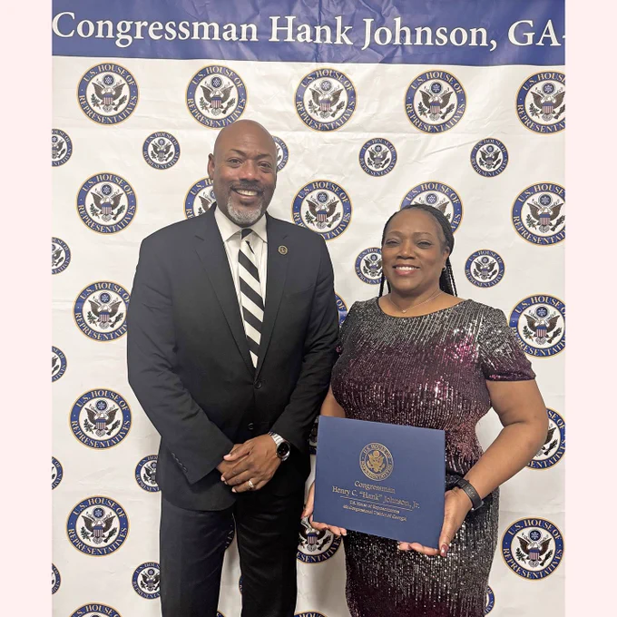 Photo from Congressman Hank Johnson’s Unsung Heroes Awards program November 17, 2024, with RCPS Superintendent Dr. Terry Oatts and Esther Maclin.