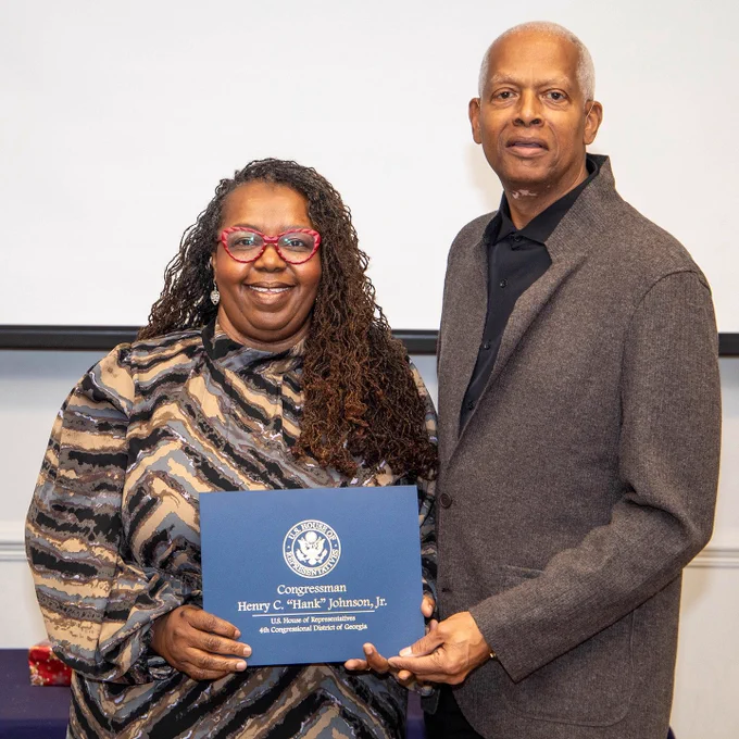Photo from Congressman Hank Johnson’s Unsung Heroes Awards program November 17, 2024, with Phontonia Walter and Congressman Johnson.