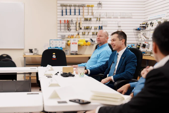 Secretary Pete Buttigieg seated at an IBEW Training Facility. 