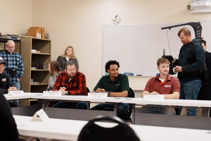 Participants seated at an IBEW Training Facility. 