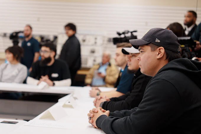 Participant seated at an IBEW Training Facility. 