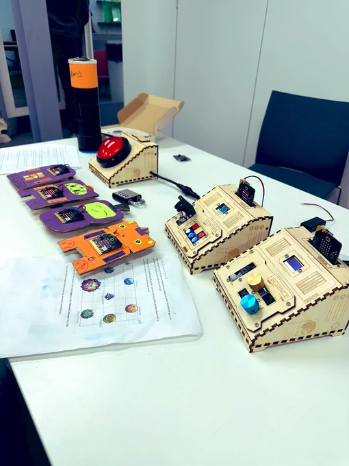 A diy escape room project that has been made with laser cut boxes, microbits, and a big red buzzer