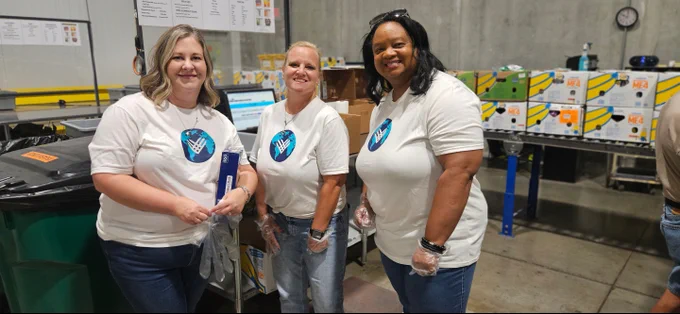 Group of GivingTuesday leaders smiling. 